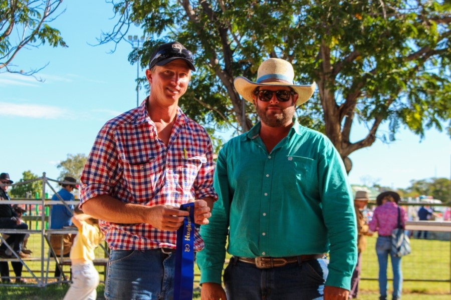 Judge Luke Carrington presenting Jack Stewart Moore of Telemon Droughtmasters with the best Cow and Calf prize