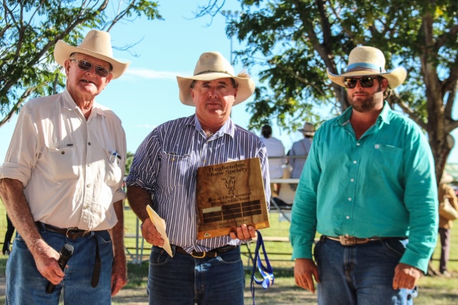 Judge Luke Carrington presents Stuart Christensen with the Pen of 3 Replacement Heifer Trophy sponsored by Bill and Lesley Bode