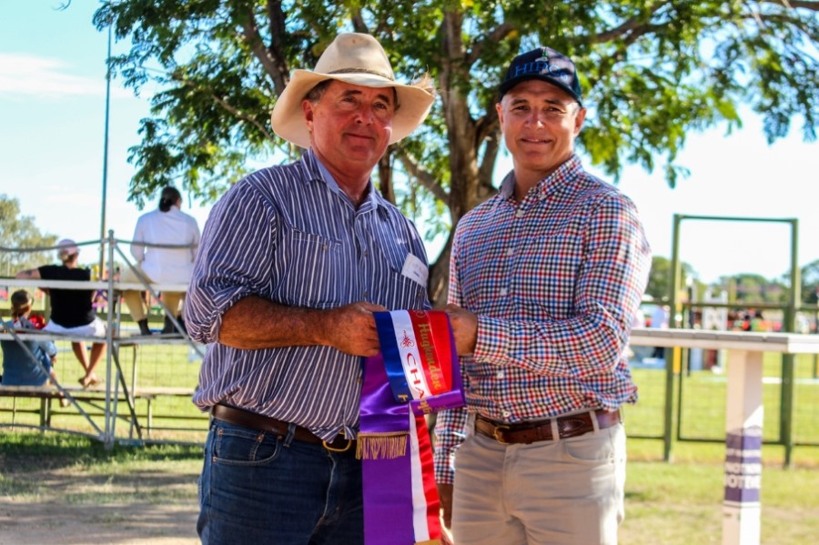 KAP State Leader Rob Katter presents Stuart Christensen with the Champion Herd Bull and Champion Commercial Female